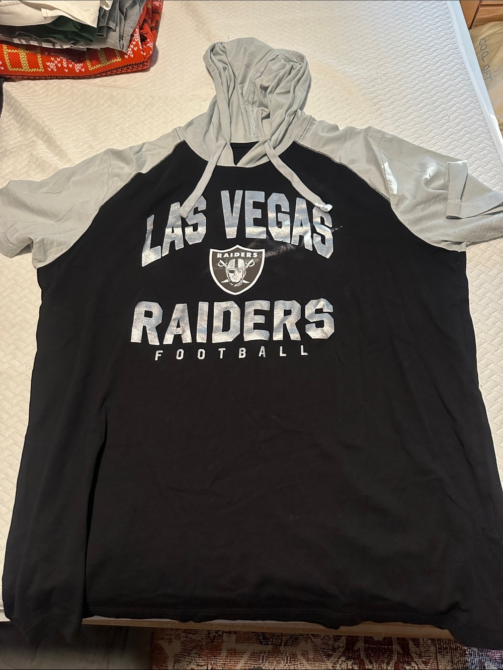 Logo Athletic Las Vegas Raiders Black and Grey Hooded Raglan Tee. Short sleeve